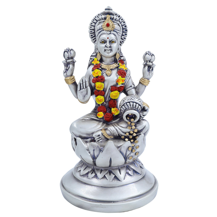 Antique silver finish Lakshmi idol seated on lotus with garland and coin pot – ideal for Diwali pooja or home décor.