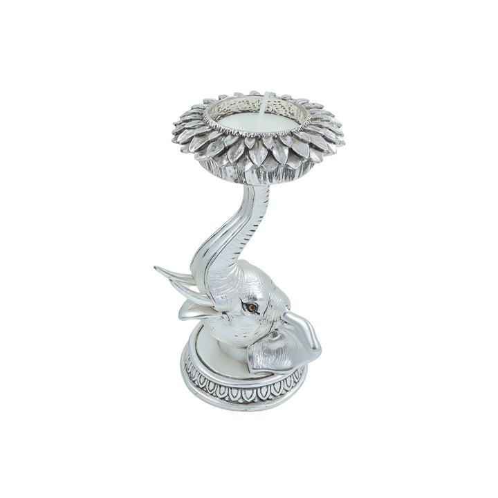 Silver antique elephant candle stand with lotus petal design holder – ideal for Indian home décor or spiritual gifting.